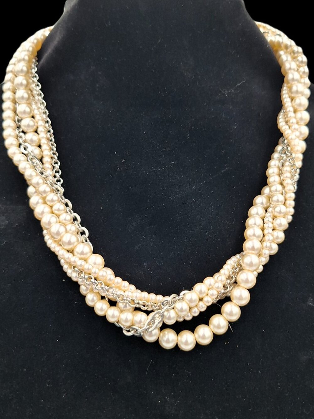 Multi-layered torsade-style twist strand necklace